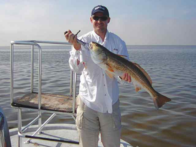 Spencer Pellegrin Landed this 10 lb red while fishing out of Arroyo River