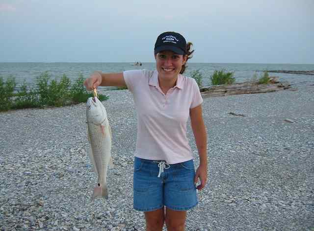Wendy Frushay first redfish!Caught on a gold spoon and released&nbsp;