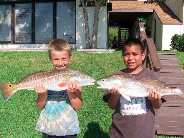 Dean Loessberg and MJ Villarreal Padre Islandpair of reds