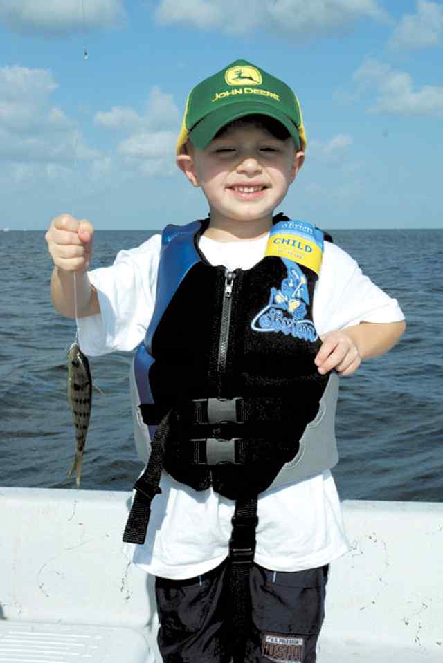 Tanner "The Tan Man" Johnson first piggy perch!Caught while fishing with his MeeMaw, Pam Johnson