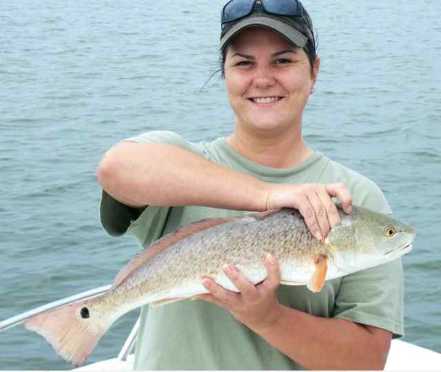 Lisa Thompson Lower Laguna Madrefirst redfish!