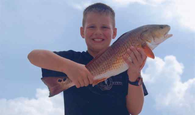 Kale Cator Drift fishing the flats in Port Mansfield25” redfish