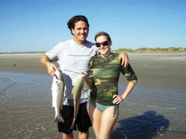 Blayde Carrol and Allison Carson San Jose Island - double hook up of reds while surf fishing