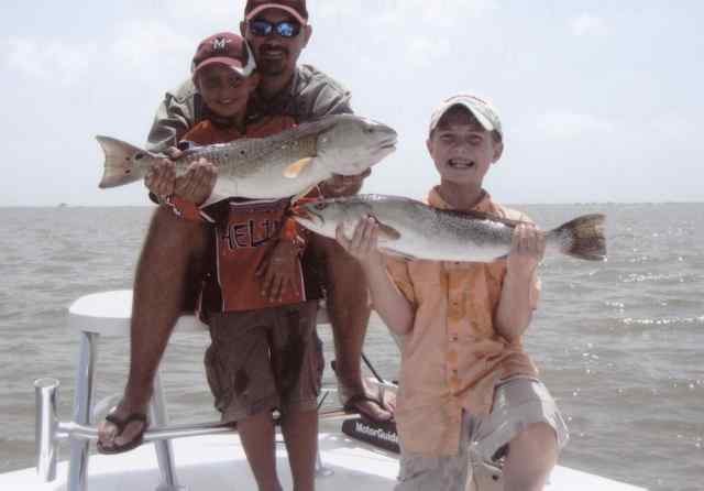 Chris and Austin Murray, & Cameron Arnold 29&quot; redfish &amp;  27&quot; trout