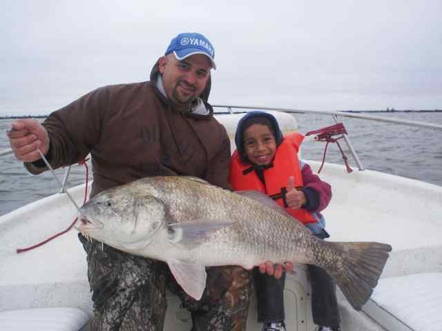 Christopher Ventura First bull red! Caught while fishing with his father.