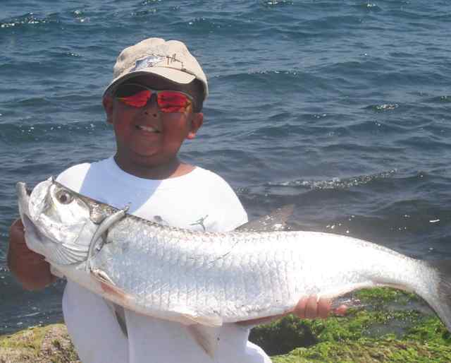 Oscar Gonzalez Boca Chica jetties 
 
proudly showing off his catch of the day