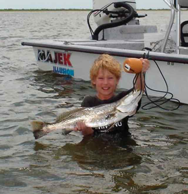 Weston Watson Grinning from ear to ear while he shows off his trout