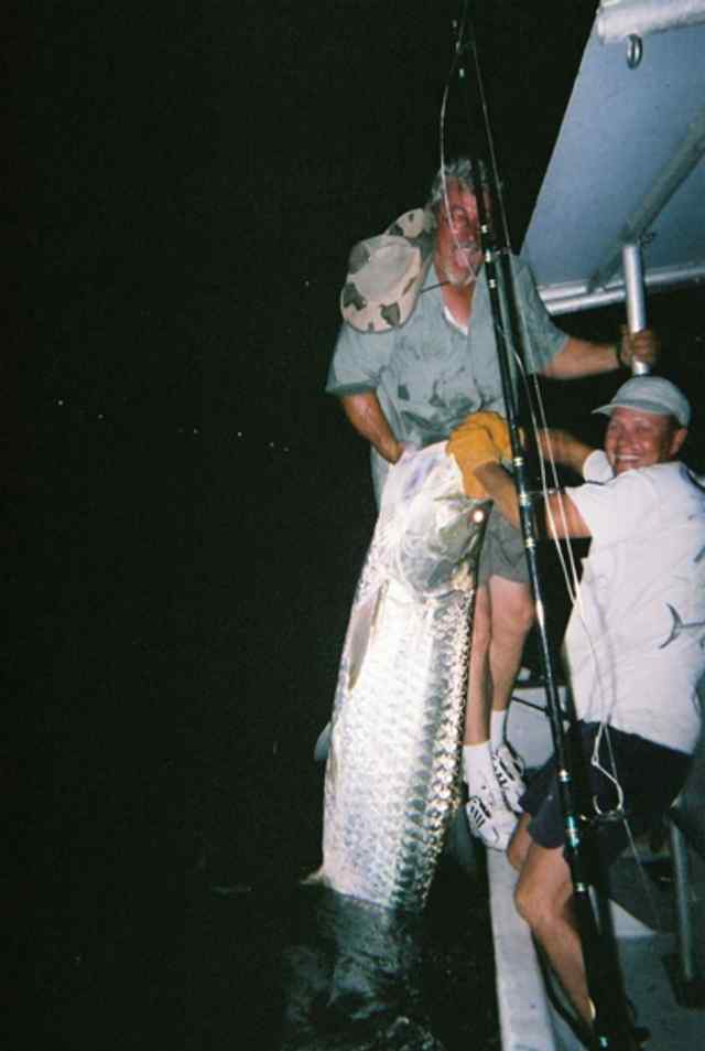 Larry Benham and friends Port Isabel7' 175lb tarpon CPR