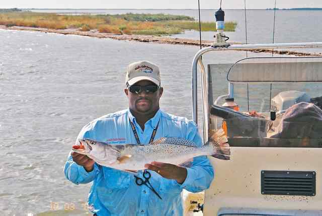 Darrell Adell 28&quot; trout, caught on a red/white Seashad Assassin
