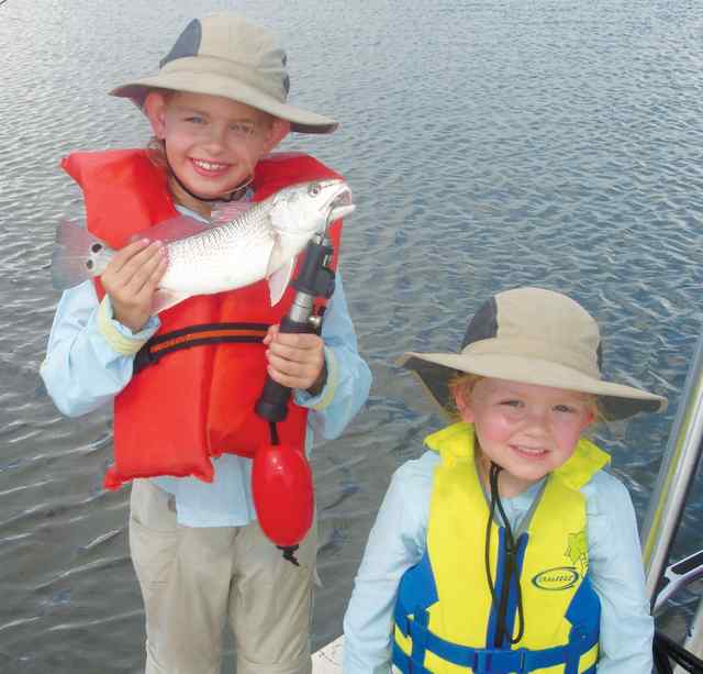 Josie & Neely Burrier South Pass Lake
first redfish!