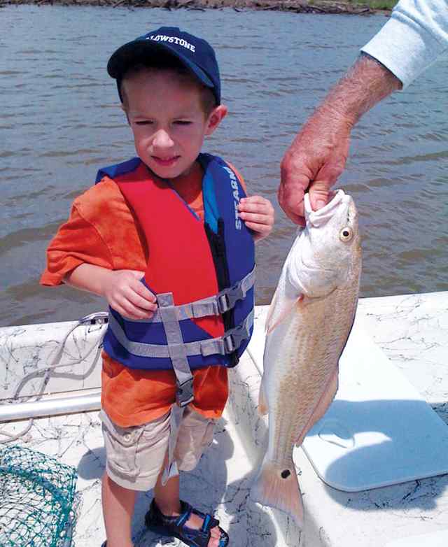 Braden Orsak West Matagorda Bay21&quot; first keeper redfish!