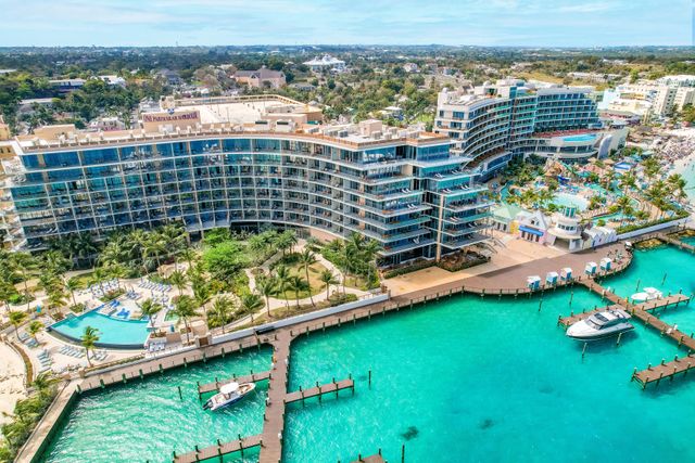 241112-MVNassauBeachResort-Exterior-OPH2.jpg Scenic aerial view showing resort layout with pool and marina