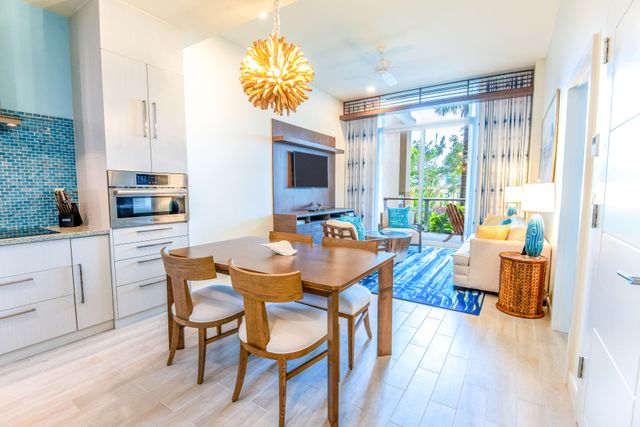 241112-MVNassauBeachResort-OPH-9068.jpg Open-concept living and dining area with modern coastal design